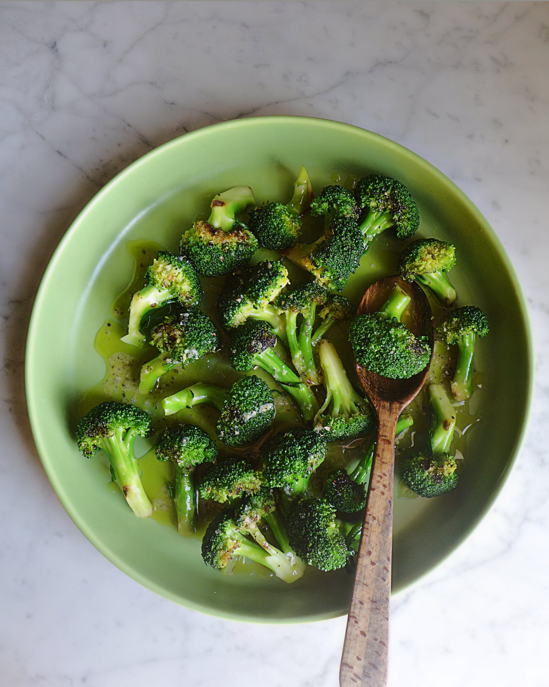 a bowl of food with broccoli
